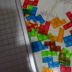 Jocul de societate Blokus cu pătrate pentru 4 jucători, primit de la cumpărătorul A****n.